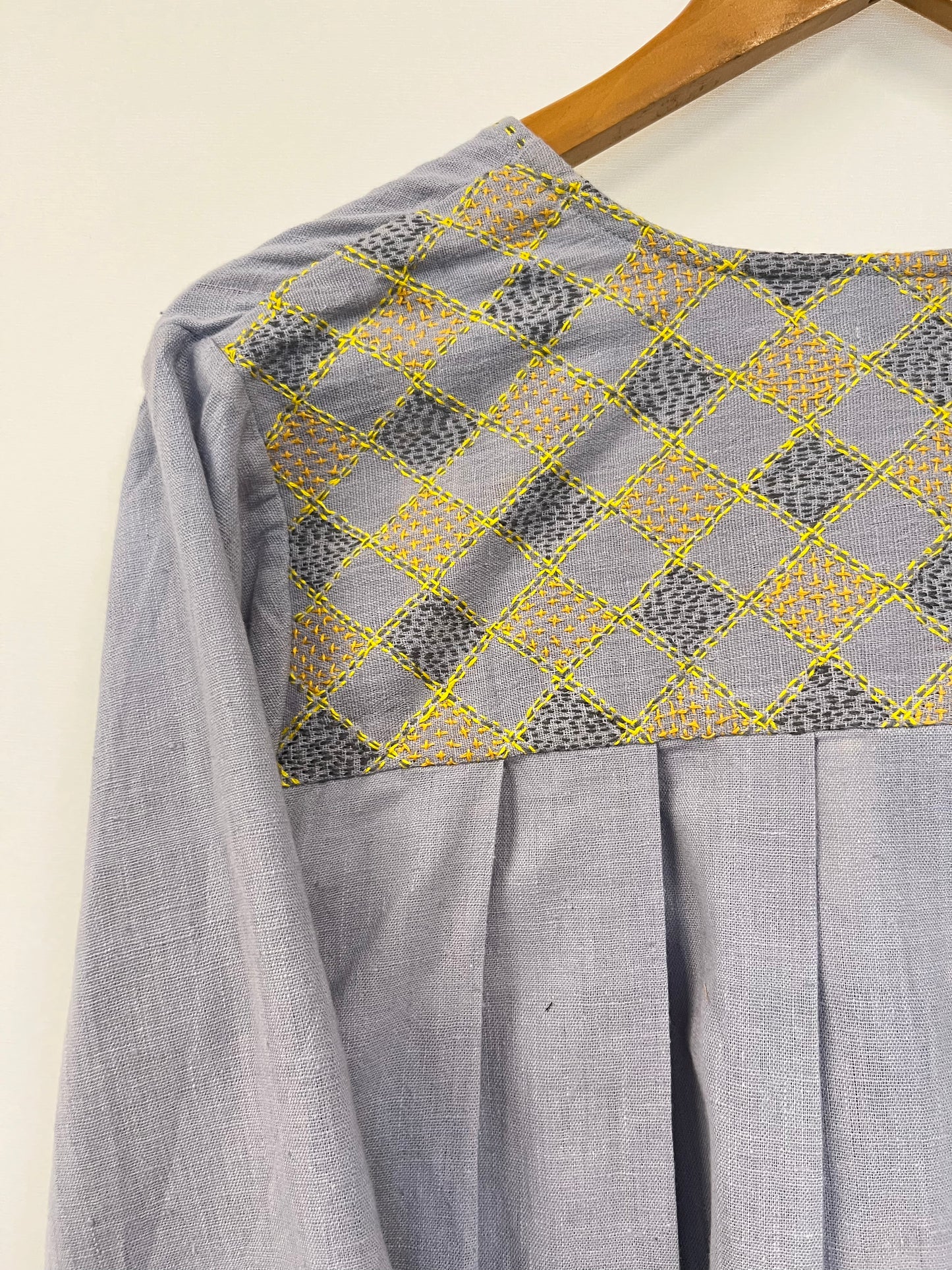 Woven wrap top