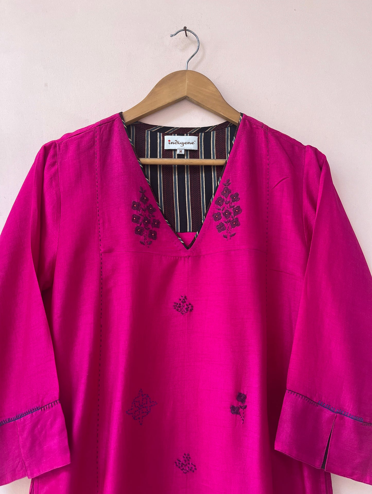 Fuschia hand embroidered V neck rounded hem kurta