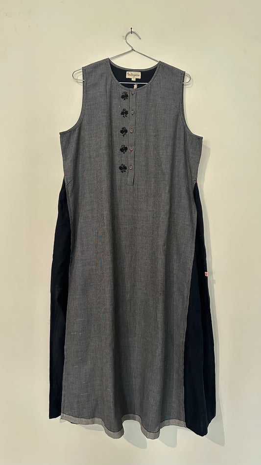 Aura layered dress with embroidered details.
