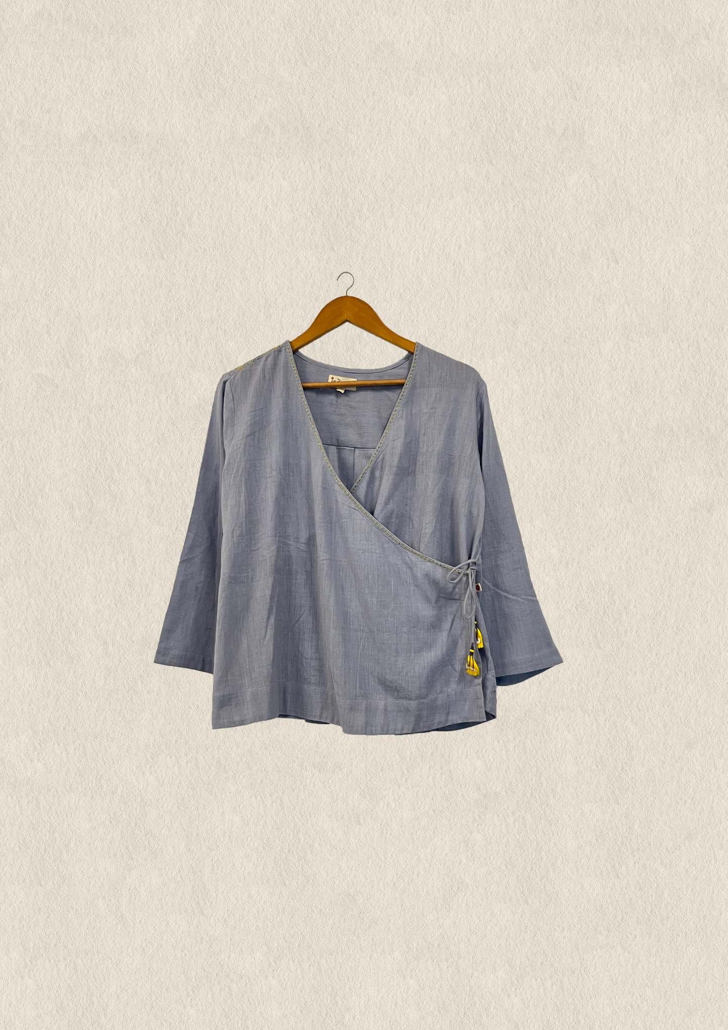 Woven wrap top