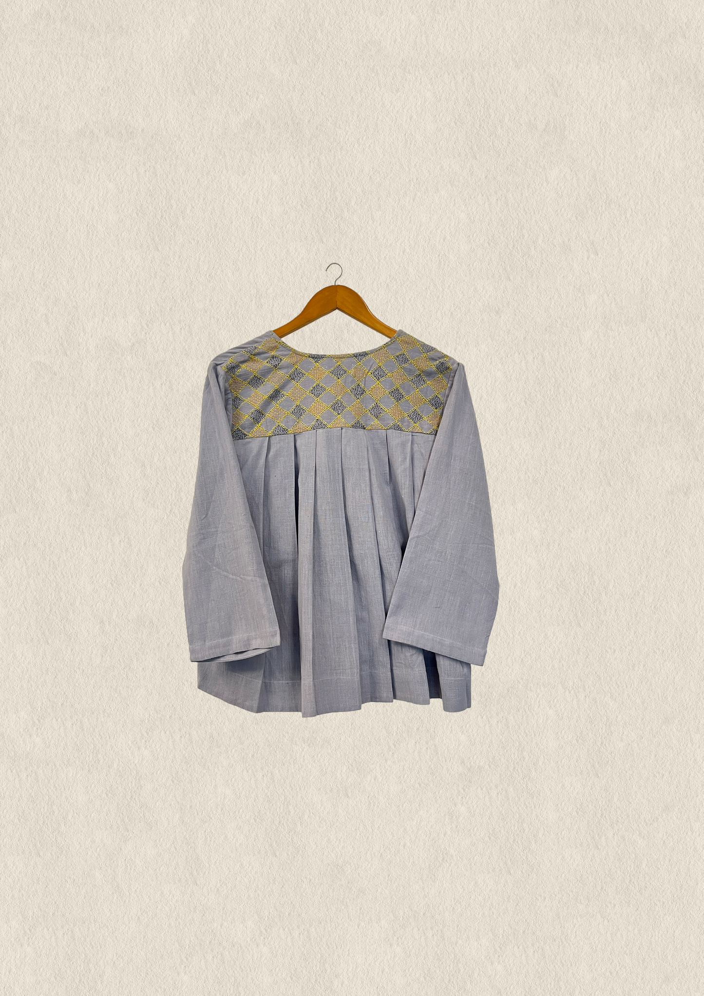 Woven wrap top